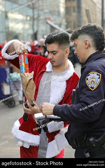 New York, USA, December 09, 2023 - Thousands of Peoples Dressed in Santa Costume Celebrated today the 2023 SANTACON in New York City