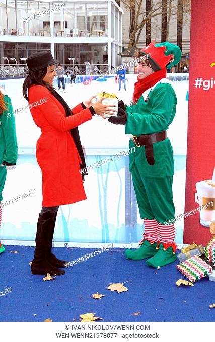 Rosario Dawson and 100 elves spread holiday cheer in Bryant Park Featuring: Rosario Dawson Where: Manhattan, New York, United States When: 02 Dec 2014 Credit:...