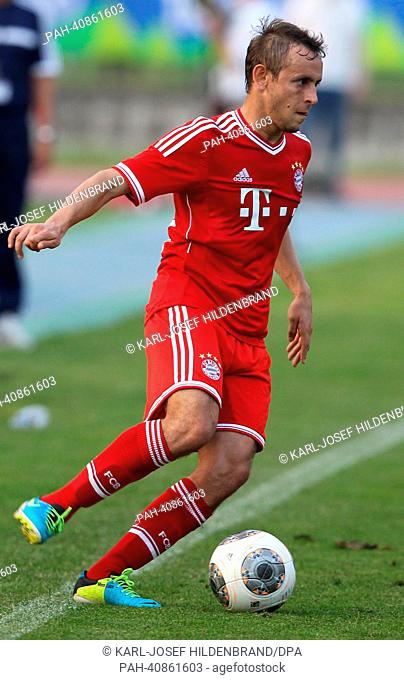 Bayerns Rafinha during a test match in Arco, Italy, 05 July 2013. From 04 until 12 July 2013 the Bundesliga team prepares for season 2013-14 in a training camp...