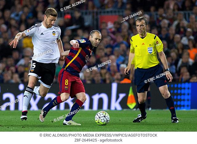 Andres Iniesta (8) against Mustafi (5). . Liga BBVA Season 2015-2016 33 round game between FC Barcelona and Valencia CF. Camp Nou, Barcelona, Spain