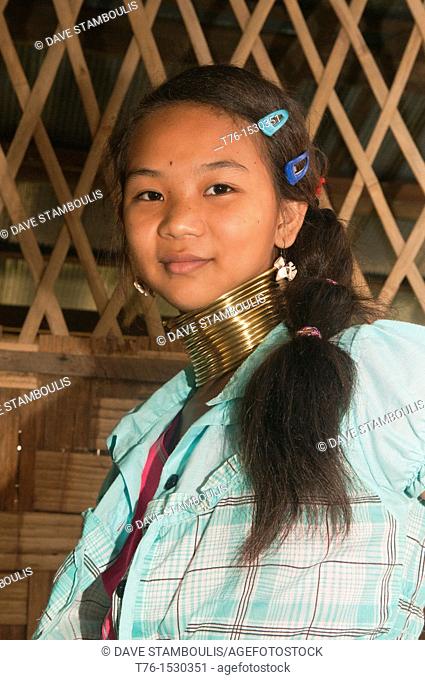 Mo Ji, one of the last young Padaung Longneck Karen girls to wear the brass coils in her village of Ban Nai Soi in northern Thailand
