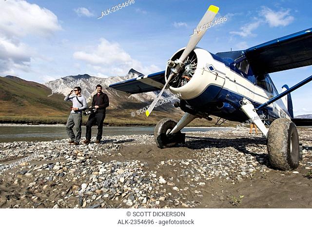 Bushplane arriving at the Noatak River, Brooks Range, Arctic Alaska; Alaska, United States of America