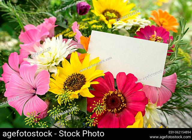 Greeting card with copy space and colorful summer flowers