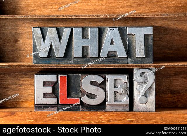 what else question made from metallic letterpress type on wooden tray