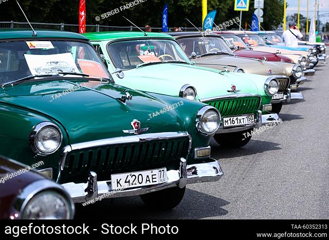 RUSSIA, MOSCOW - JULY 9, 2023: GAZ-21 Volga retro cars are on display during a vintage vehicle festival marking Moscow Public Transport Day on Sparrow Hills