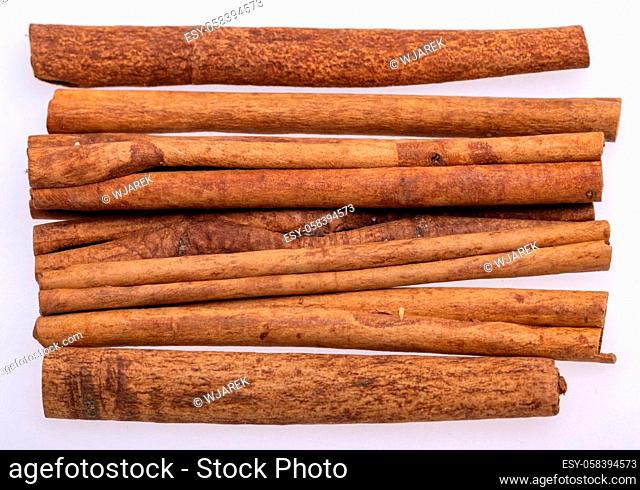 Cinnamon sticks, classic spice from the inner bark of tropical Asian trees, flavorful and aromatic for cooking, baking, health food and medicinal uses