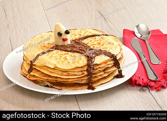 Pile Of Baked Pancakes and Banana Character Lying on Pancakes