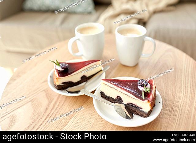 pieces of chocolate cake on wooden table