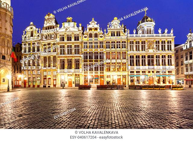 Beautiful houses of the Grand Place Square at night in Belgium, Brussels. From right to left Le Roy d'Espagne, La Brouette, Le Sac, La Louve, Le Cornet