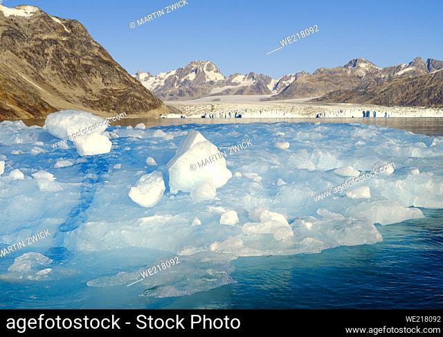 Iceberg in front of Knud Rasmusen Glacier (also called Apuseeq Glacier) in Sermiligaaq Fjord. Ammassalik region in the north east of Greenland