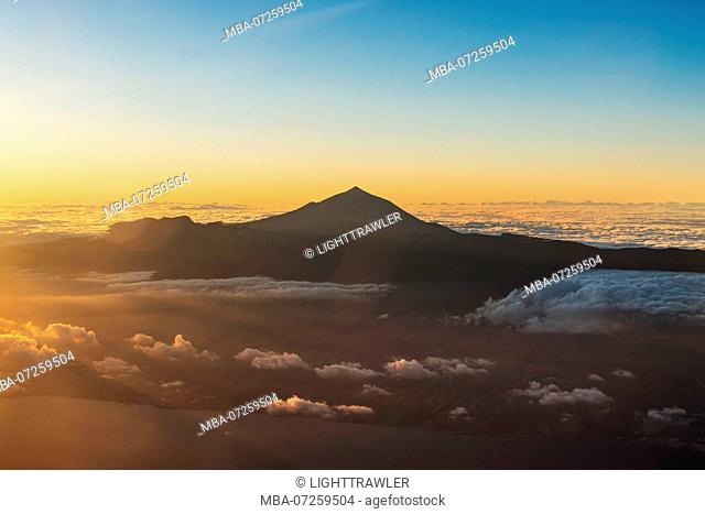 Aerial view of the Canary Island of Tenerife with the summit of Mount Teide at sunset