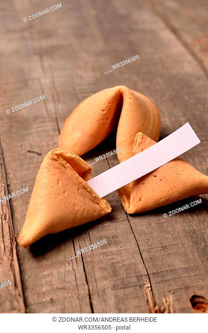 Fortune cookies on an old wooden table