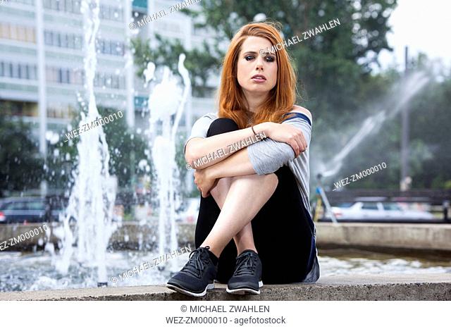 Germany, Berlin, Young woman crying