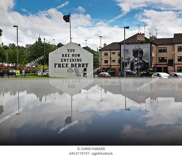 United Kingdom, Northern Ireland, County Londonderry, Reflected View Of Murals In Bogside Area; Derry