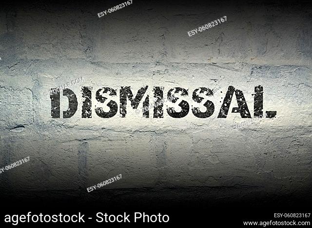 dismissal stencil print on the grunge white brick wall