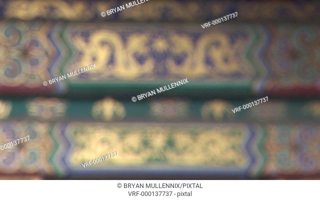 Ornate painted boards from a ceiling of a pagoda, Lama Temple, Beijing, China, Coming into Focus