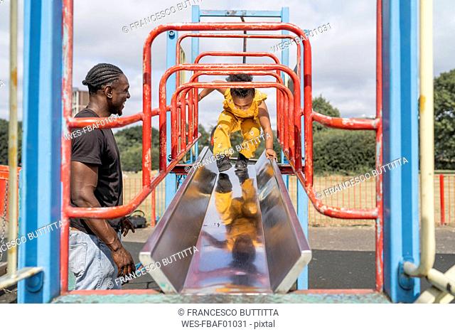 Father and daughter on a playground