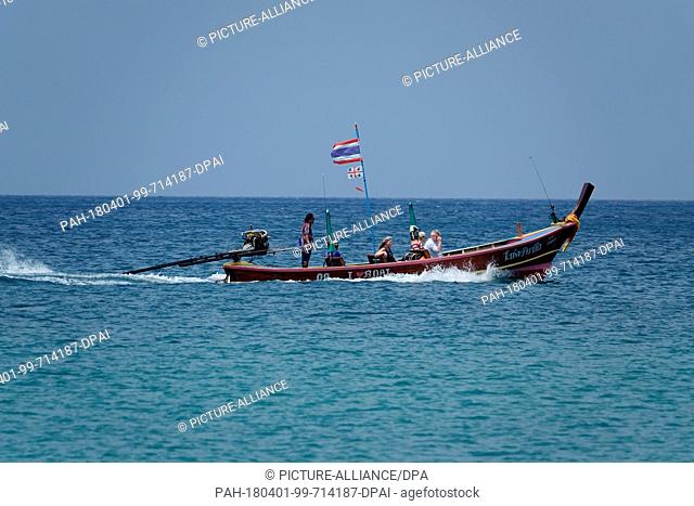 12 March 2018, Thailand, Karon Beach: A longboat sailing on the Andaman Sea off Karon Beach on the island of Phuket. Photo: Alexandra Schuler/dpa