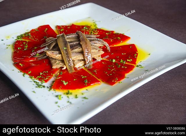 Salad made of Piquillo peppers, tuna loin, anchovy fillets, parsley and olive oil. Spain