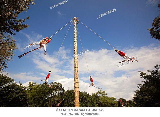 Papantla Flying Men-Voladores de Papantla Region during a performance in Xcaret Ecological Park near Playa del Carmen, Cancun, Quintana Roo, Yucatan Province