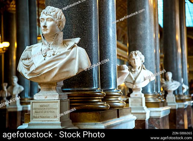 PARIS, FRANCE - MAY 27, 2011: Hall of mirrors full of tourists in the Palace of Versailles on May 27, 2011, France. The Versailles palace is in the UNESCO World...