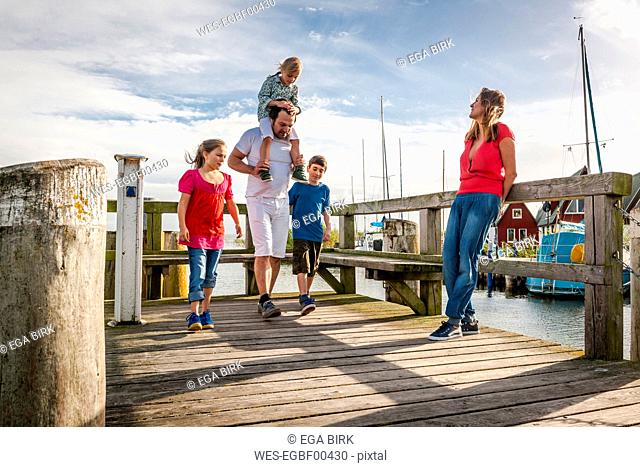 Family on a pier, Ahrenshoop, Mecklenburg-Western Pomerania, Germany