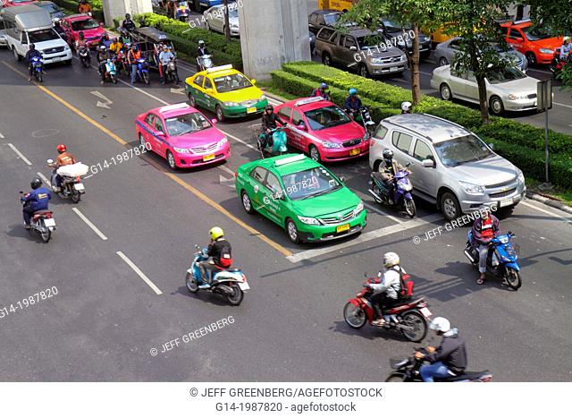 Thailand, Bangkok, Pathum Wan, Phaya Thai Road, traffic, taxi, taxis, cabs, motorcycles, motor scooters, Skywalk, view, overhead, aerial