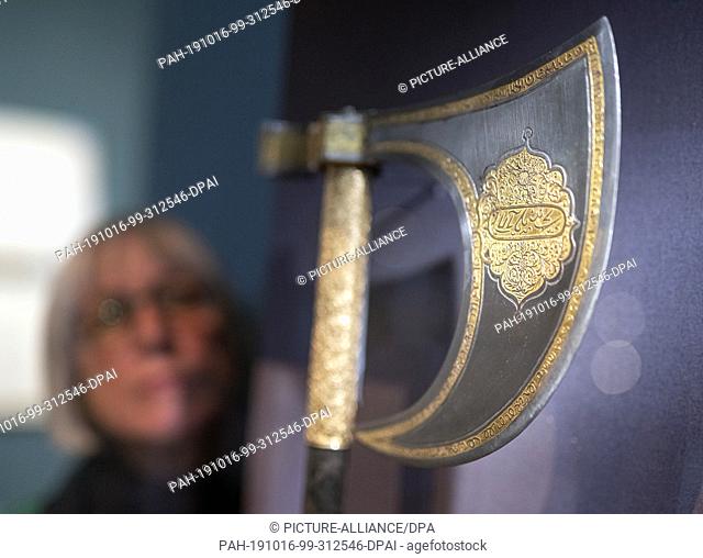 15 October 2019, Baden-Wuerttemberg, Karlsruhe: An Ottoman fire-gilt hatchet dating from the end of the 16th century is on display in the Badisches Landesmuseum