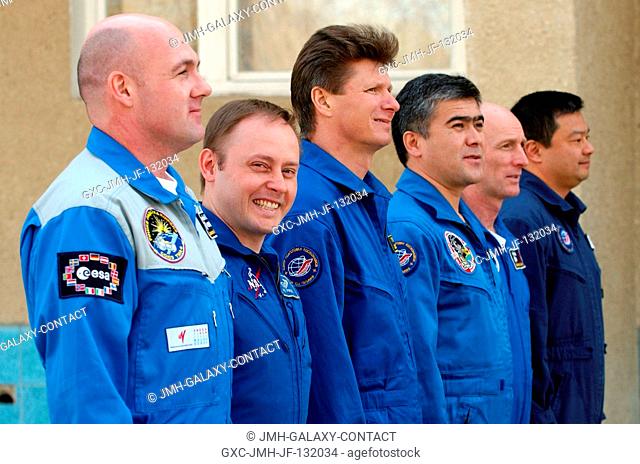 Expedition 9 prime and backup crewmembers prepare for the flag raising ceremony at the Cosmonaut Hotel, Baikonur, Kazakhstan