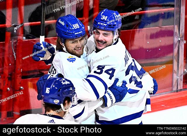 Torontos Auston Matthews (C) celebrates scoring with team mate William Nylander (#88) during the NHL Global Series Sweden ice hockey match between Toronto Maple...