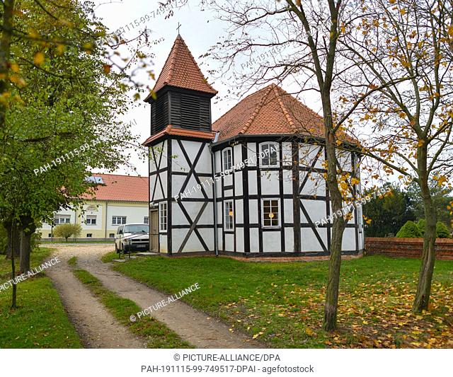 11 November 2019, Brandenburg, Altbarnim: View of the small half-timbered church. It is tiny, rustically built and now quite crooked - the half-timbered church...