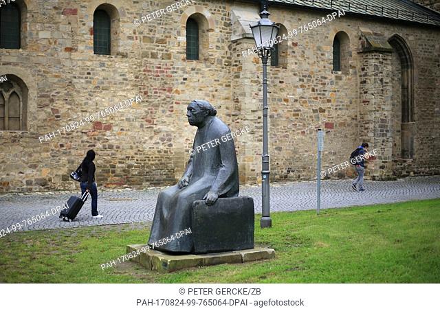 The Kathe Kollwitz Monument from 1958 standing next to the Unser Lieben Frauen Monastery Art Museum in Magdeburg, Germany, 24 August 2017