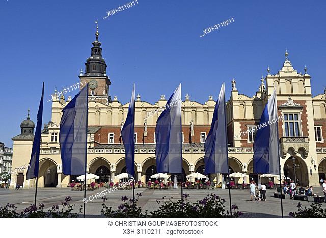 Town Hall Tower and Cloth Hall (Sukiennice) on Rynek Glowny, the main square of the Old Town of Krakow, Malopolska Province (Lesser Poland), Poland