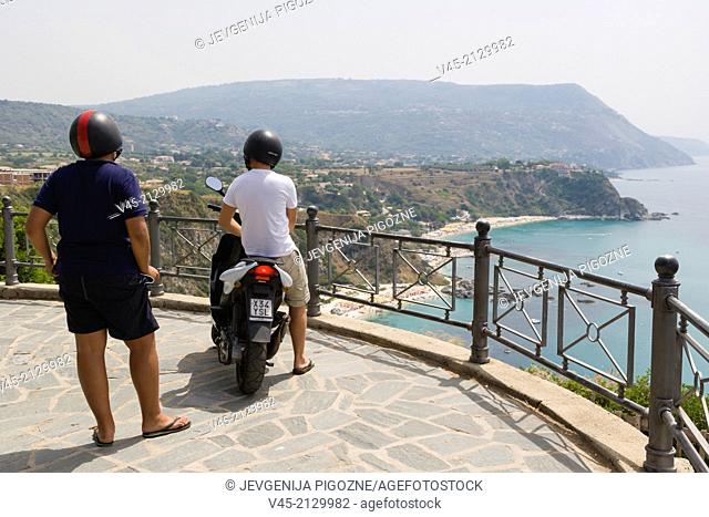 Two guys enjoying views of Capo Vaticano, Ricadi, Calabria, Southern Italy, Italy
