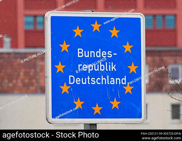18 January 2023, Brandenburg, Frankfurt (Oder): A blue sign ""Federal Republic of Germany"" with yellow stars stands at the city bridge