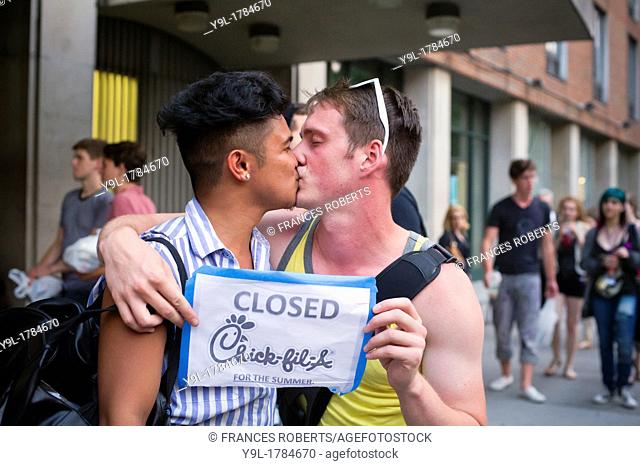 A kiss-in protesting Chick-Fil-A's President Dan Cathy's opposition to same sex marriage in Greenwich Village in New York in front of the NYU dormitory that...