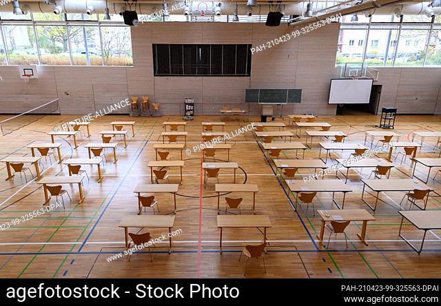 23 April 2021, Saxony, Dresden: Tables and chairs are ready in the gymnasium of the St.-Benno-Gymnasium before the start of the Abitur exams