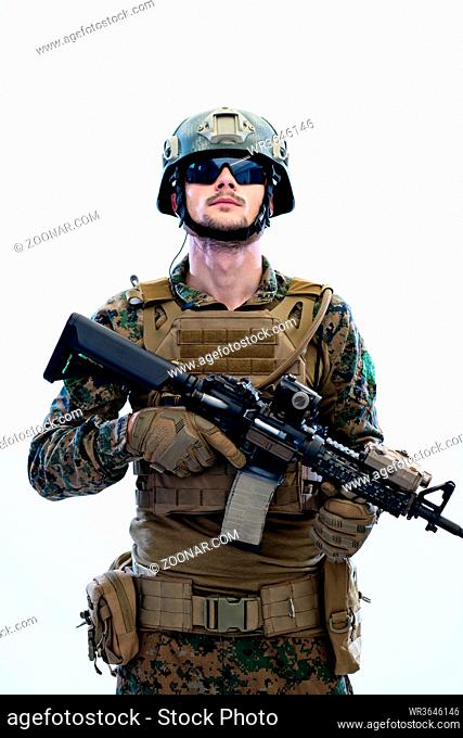 american marine corps special operations soldier with fire arm weapon and protective army tactical gear clothes Studio shot isolated on white background