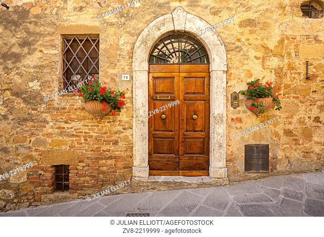 An old doorway in Pienza, Tuscany. The town was declared a World Heritage Site by UNESCO in 1996. It lies within the Val d'Orcia which has also been designated...
