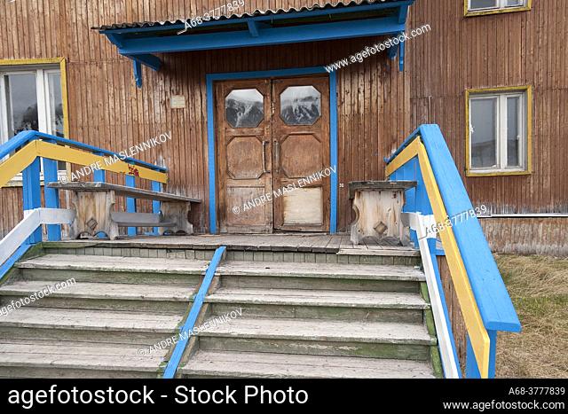 Worn stairs to a residential building. The abandoned Russian mining town of Piramida on Svalbard is visited almost every day by tourists who come there by ship...