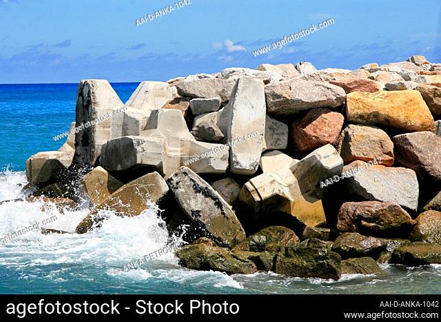 Seawall mound along the coast, La Digue Island, Seychelles