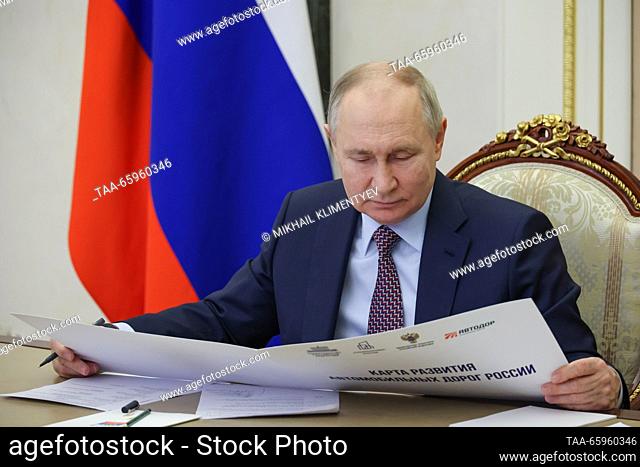 RUSSIA, MOSCOW - DECEMBER 21, 2023: Russia's President Vladimir Putin takes part in the opening ceremony of M12 Highway via a video link from Moscow's Kremlin