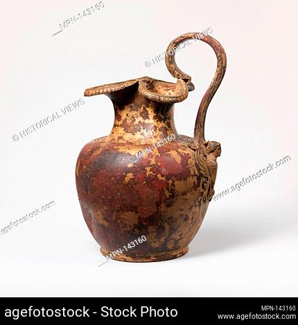 Bronze oinochoe (jug). Period: Classical; Date: ca. 460 B.C; Culture: Greek; Medium: Bronze, silver; Dimensions: H.: 8 15/16 in. (22