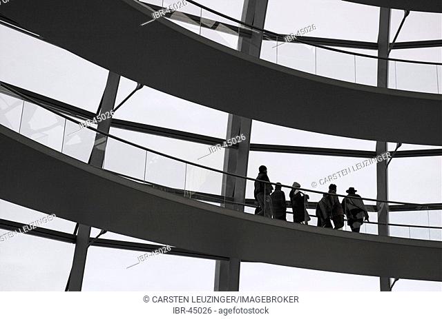 Visitors at the modern dome of the german House of Parliament Reichstag Berlin Germany