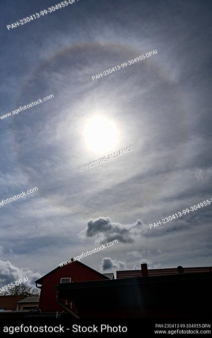 13 April 2023, Mecklenburg-Western Pomerania, Franzburg: A halo appearance in the sky. It is a light effect of atmospheric optics