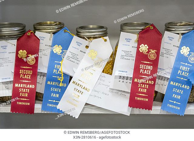 Timonium, Maryland - First and Second place jars of corn with entry tags sit along a ledge at the 2016 Maryland State Fair