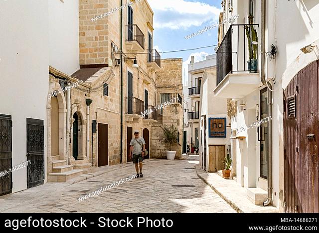 Tourist in the old town, Polignano a Mare, Puglia, South Italy, Italy, Europe