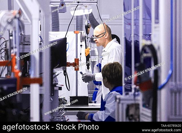 RUSSIA, MOSCOW - JULY 25, 2023: A research and development engineer of a project for production of anti-lock braking systems (ABS) and electronic stability...