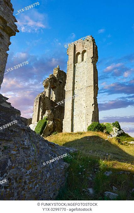 Medieval Corfe castle keep close up sunrise, built in 1086 by William the Conqueror, Dorset England