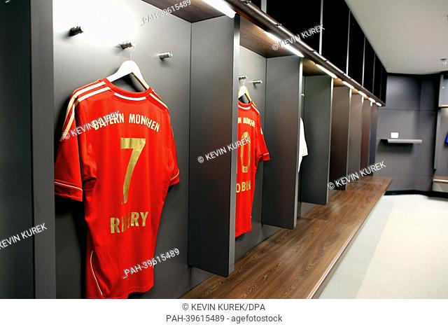Soccer jerseys of players Franck Ribery (L) and Arjen Robben of FC Bayern Munich hang in a changing room of the Wembley Stadium in London, Great Britain